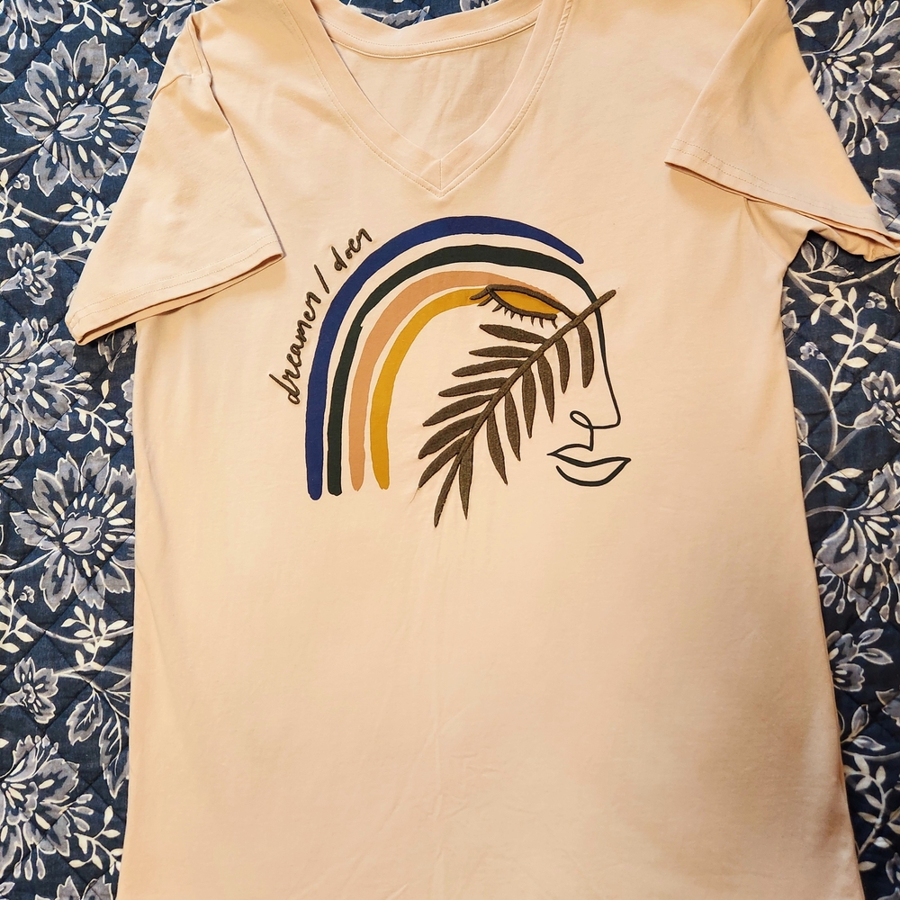 Beige Graphic Tee with Artistic Design